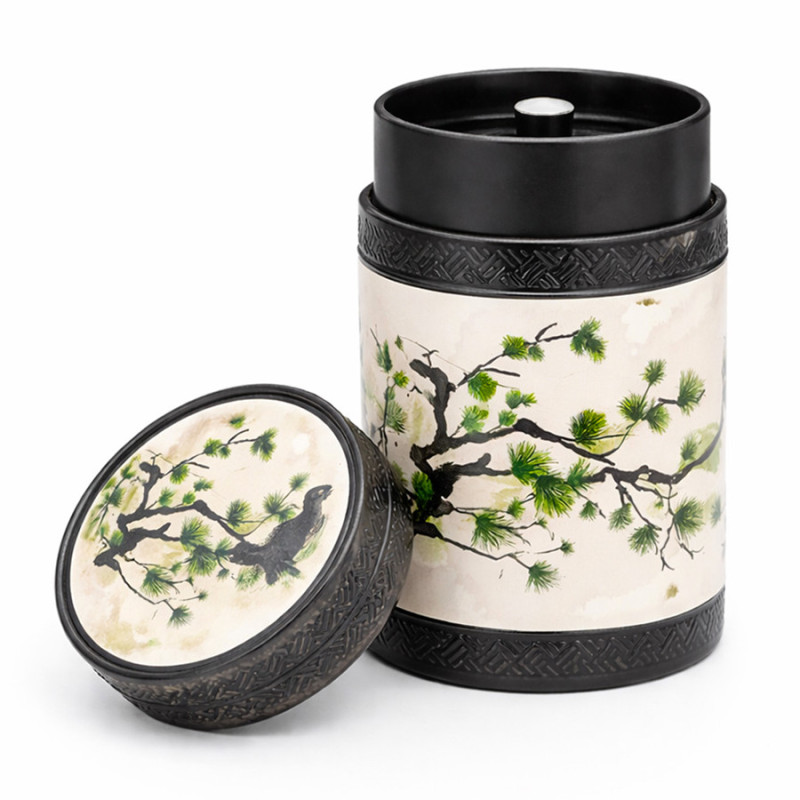 Akashi green tea caddy with pine branch and bird decoration with black lid adorned with engraved patterns
