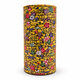 Yellow cylindrical box with traditional Japanese floral pattern for Thés & Traditions tea