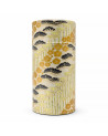 cylindrical box in washi paper with flower and bamboo patterns in gold, black and green tones