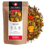 Mélange de rooibos tarte tatin pomme caramel avec morceaux de fruits et feuilles vertes