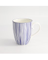 White porcelain mug with vertical blue line motifs and rounded handle, 38cl