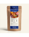 Wiederverschließbarer Kraftpapier-Beutel mit Kräutertee Mochi-Blüte, dunkelblauem und goldenem Etikett von Thés & Traditions, Fe
