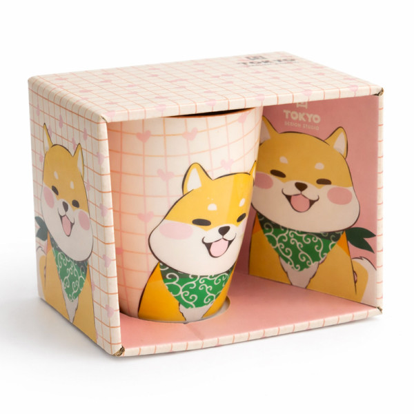 Mug with smiling Shiba dog illustration, green scarf and matching packaging
