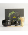 Kuro matcha set: black ceramic bowl, bamboo whisk and whisk holder in front of the gift box