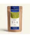 Bustina kraft richiudibile di Matcha vaniglia, etichetta blu navy e oro Thés & Traditions, finestra che lascia intravedere il mi