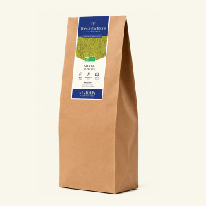 Grande sacco kraft di Matcha Aura Bio sfuso da un chilo, etichetta blu navy Thés & Traditions, vista di tre quarti