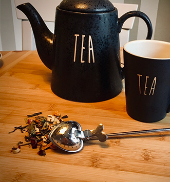 Infuseur de thé avec manche théière